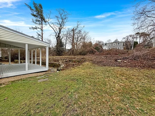 a view of a patio with wooden floor