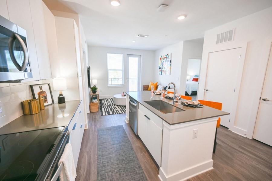 72 Milton Avenue Southeast, Unit 3407 Atlanta, GA 30315 - Photo 2 of 27 a kitchen with a stove and a sink