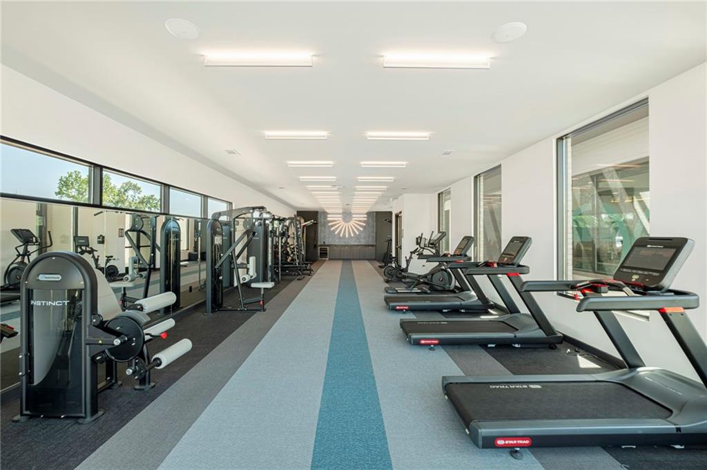 72 Milton Avenue Southeast, Unit 3407 Atlanta, GA 30315 - Photo 24 of 27 a view of a room with gym equipment