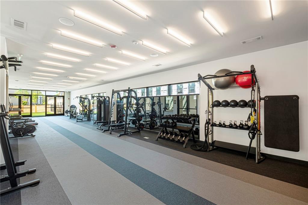 72 Milton Avenue Southeast, Unit 3407 Atlanta, GA 30315 - Photo 25 of 27 a view of a room with gym equipment