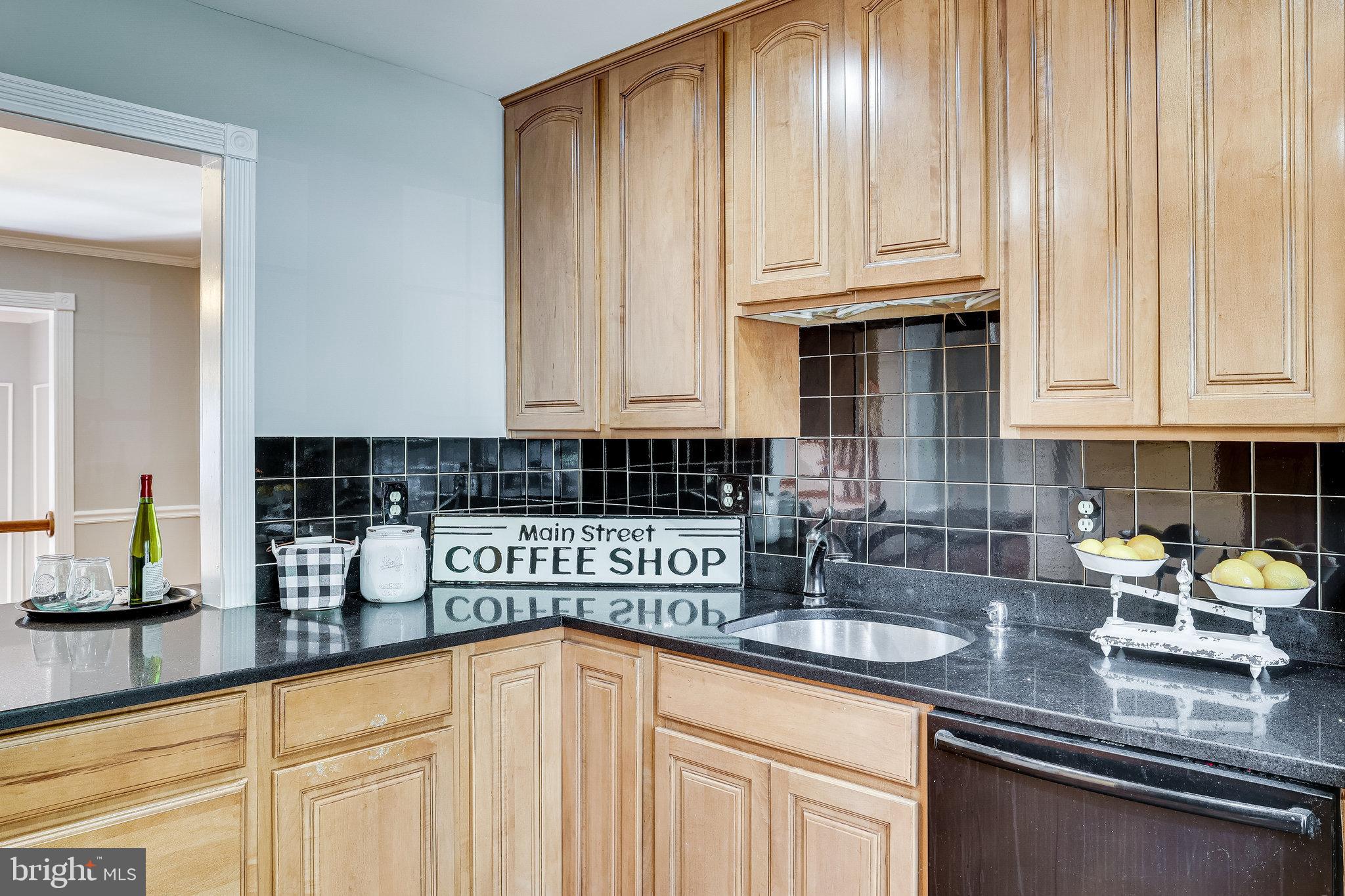 11865 Dunlop Court Reston, VA 20191 - Photo 13 of 76 Stunning kitchen with pass-through to dining area