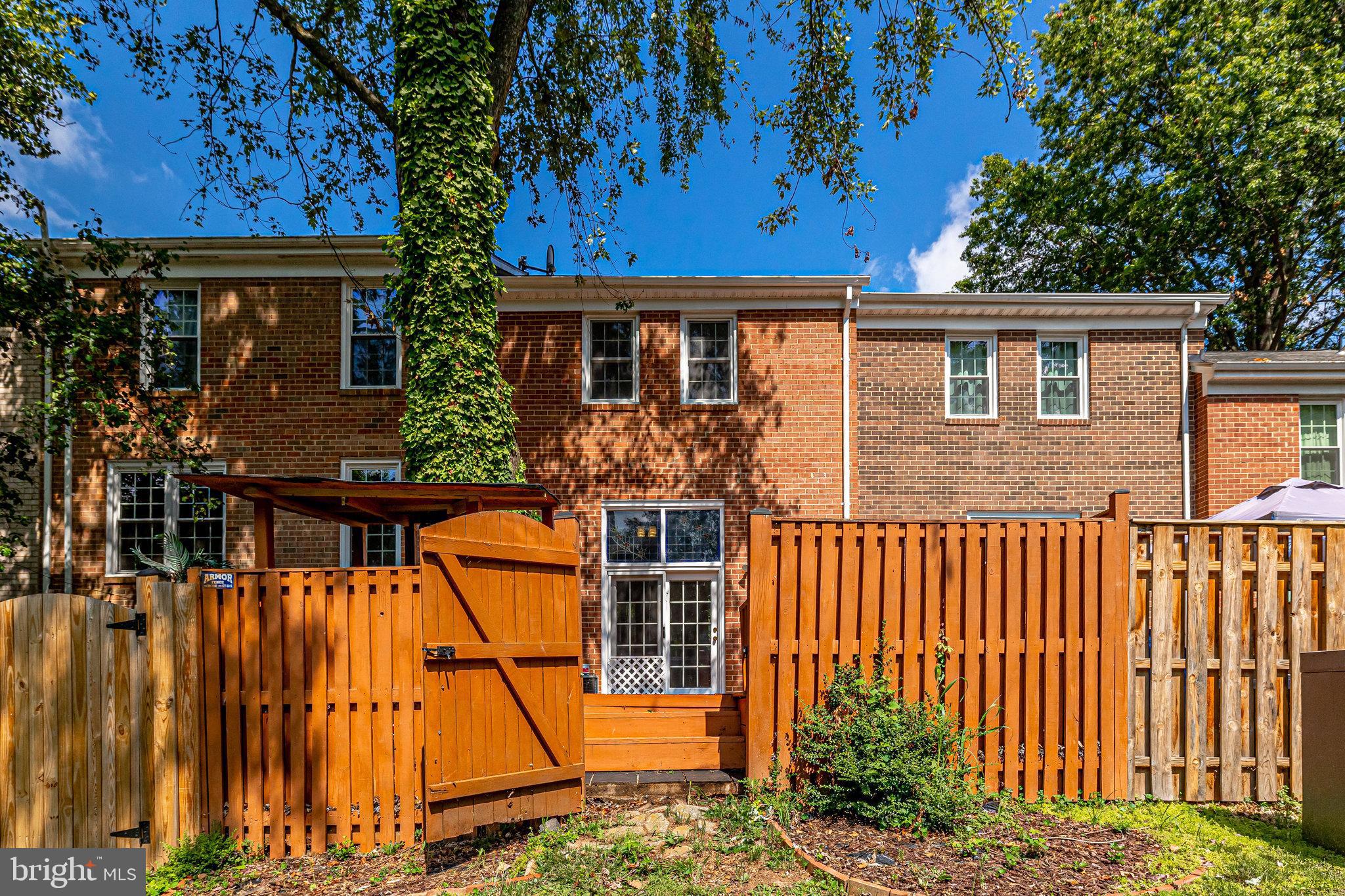 11865 Dunlop Court Reston, VA 20191 - Photo 59 of 76 Fully fenced rear deck with access to common area