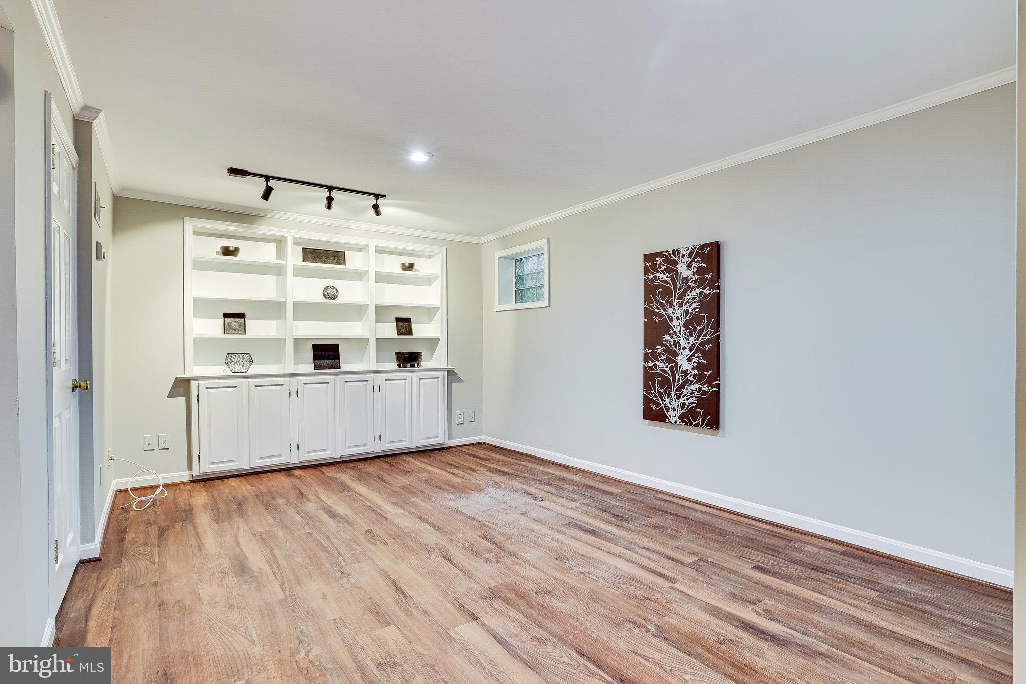 11865 Dunlop Court Reston, VA 20191 - Photo 10 of 76 Finished lower level with custom built-ins