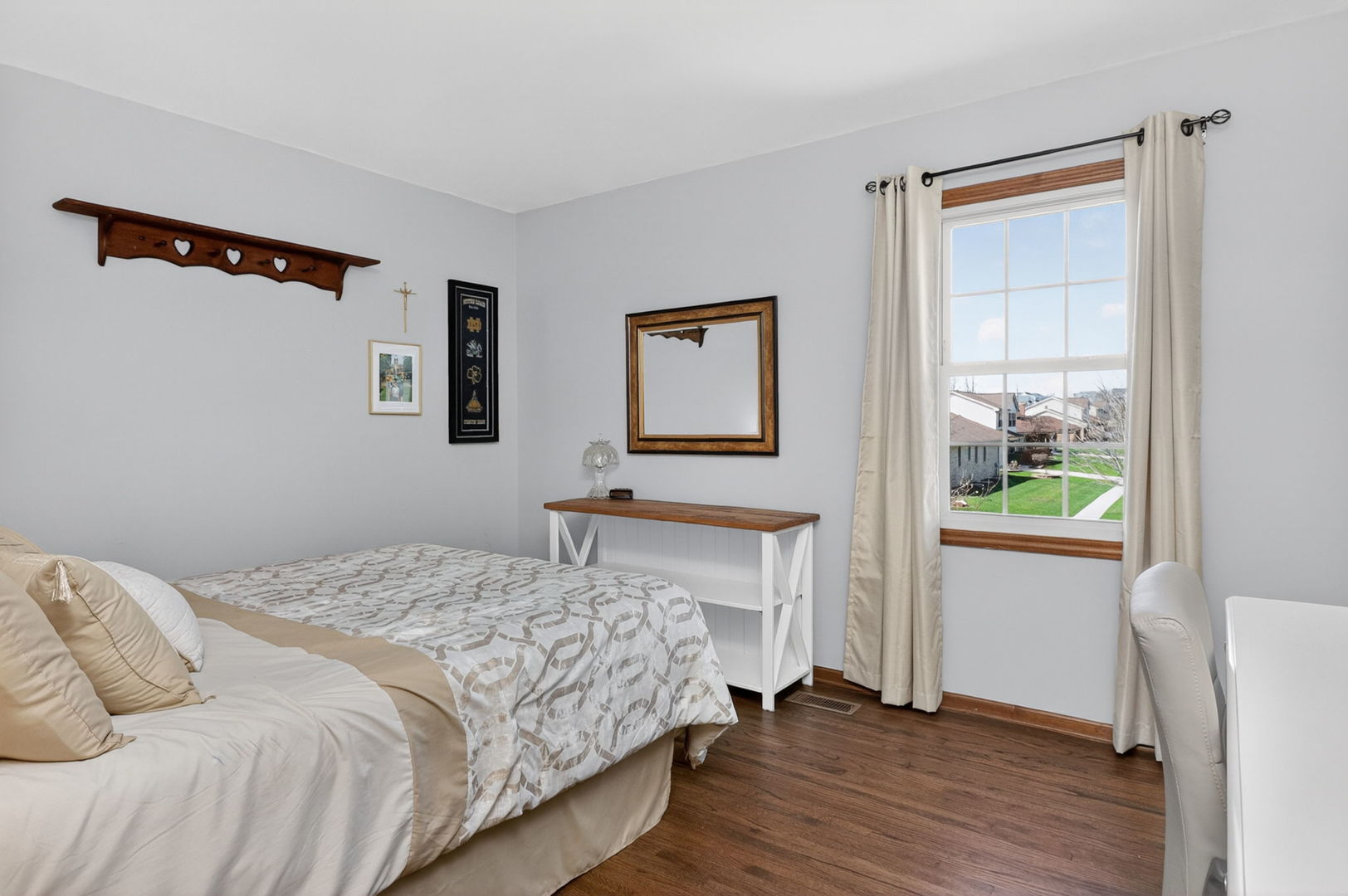 2123 Green Valley Road Darien, IL 60561 - Photo 18 of 30 a bedroom with a bed and a window