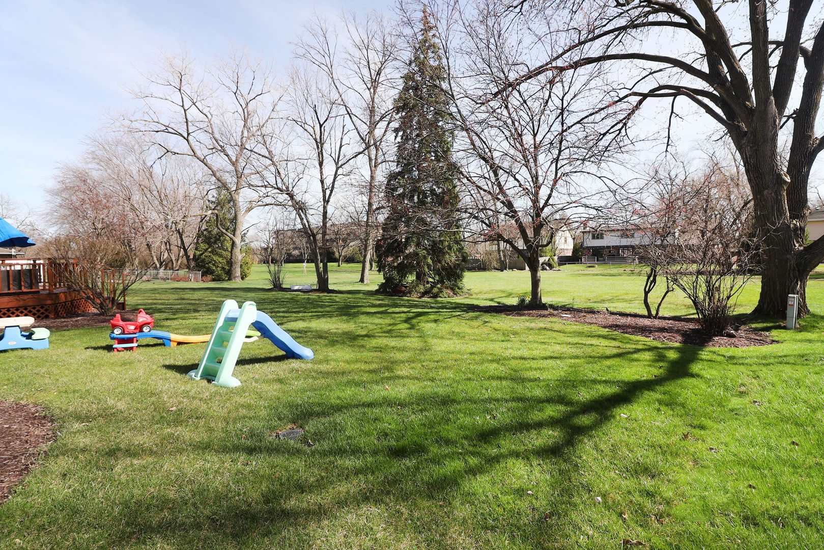 2123 Green Valley Road Darien, IL 60561 - Photo 26 of 30 a view of a park with slide and bench