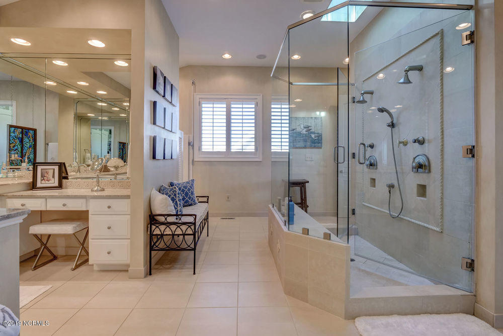 264 Beach Road North Wilmington, NC 28411 - Photo 30 of 51 Owners Bathroom with his and her sides.