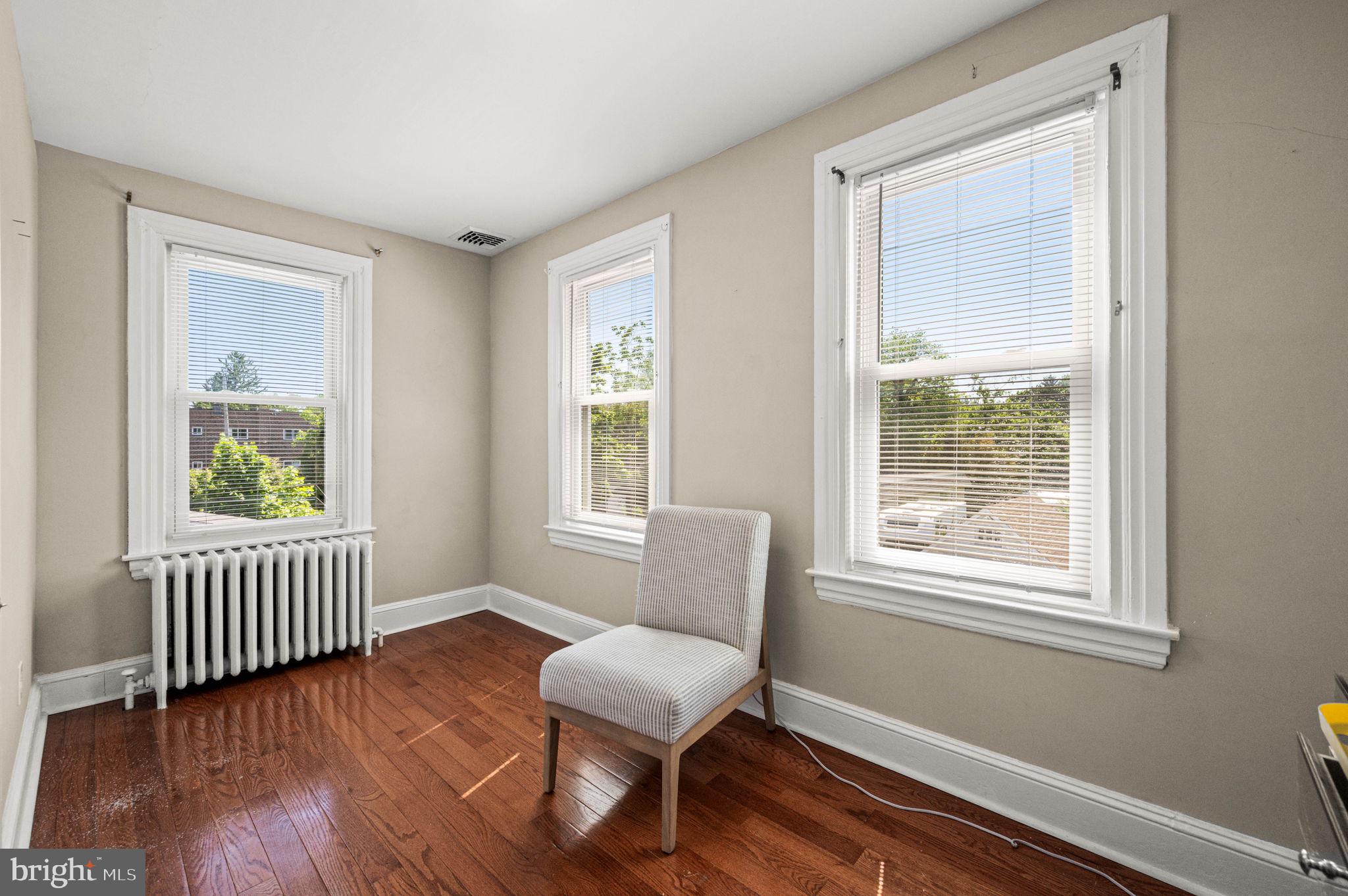 19 State Road Media, PA 19063 - Photo 8 of 18 a view of a room with windows and wooden floor