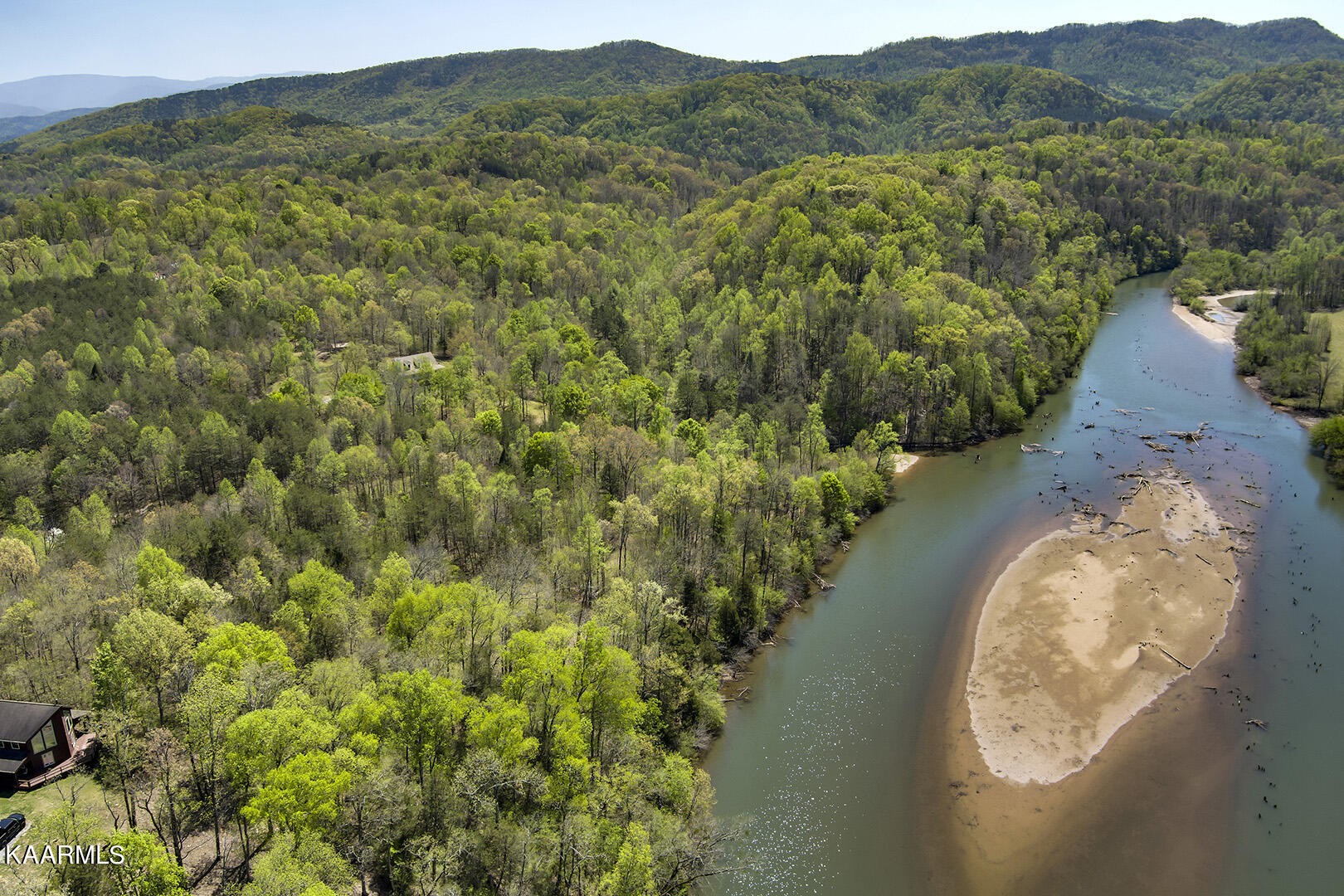3320 Ballplay Road Tellico Plains, TN 37385 - Photo 2 of 21 an aerial view of a house with a yard and lake view