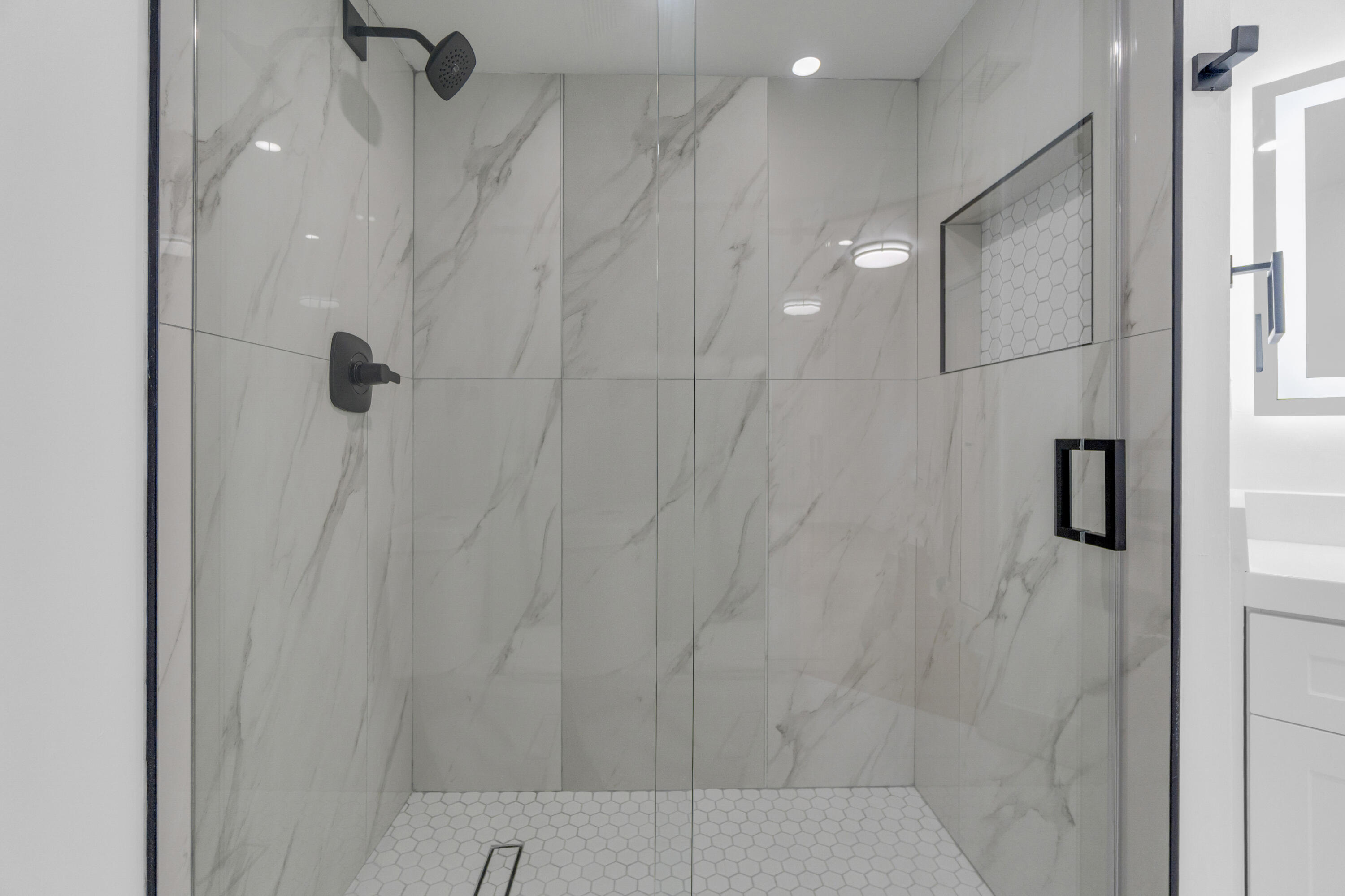 400 Crestwood Court North, Unit 420 Royal Palm Beach, FL 33411 - Photo 24 of 44 a bathroom with a shower