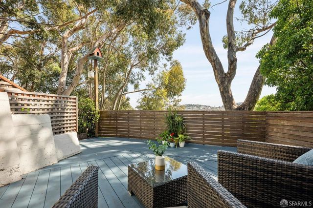a view of a bench in a backyard