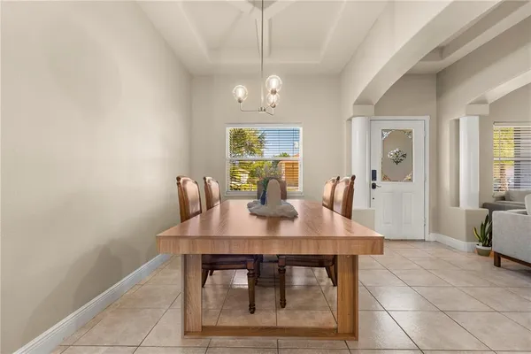 a view of a dining room with furniture