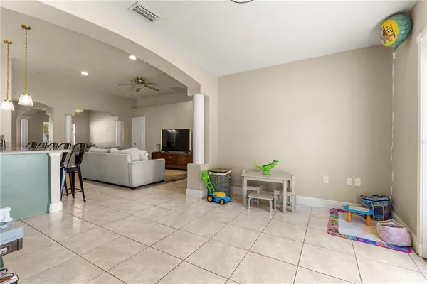 a living room with furniture and a table