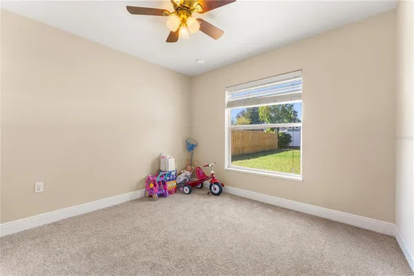 a room with toys and white walls