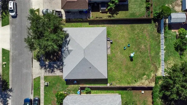 an aerial view of a house having yard