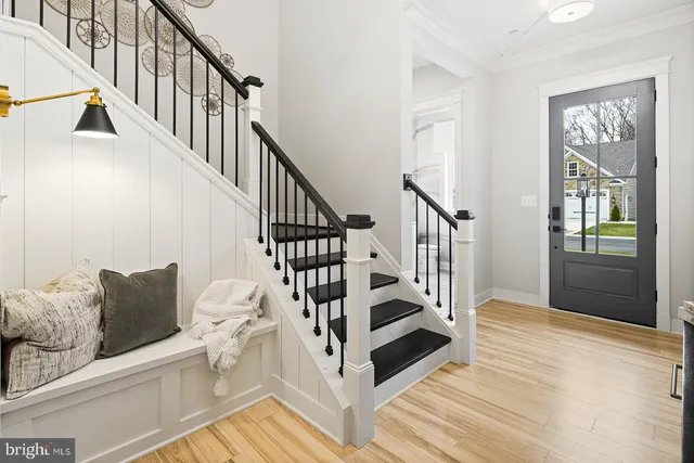 a kitchen with stainless steel appliances and refrigerator