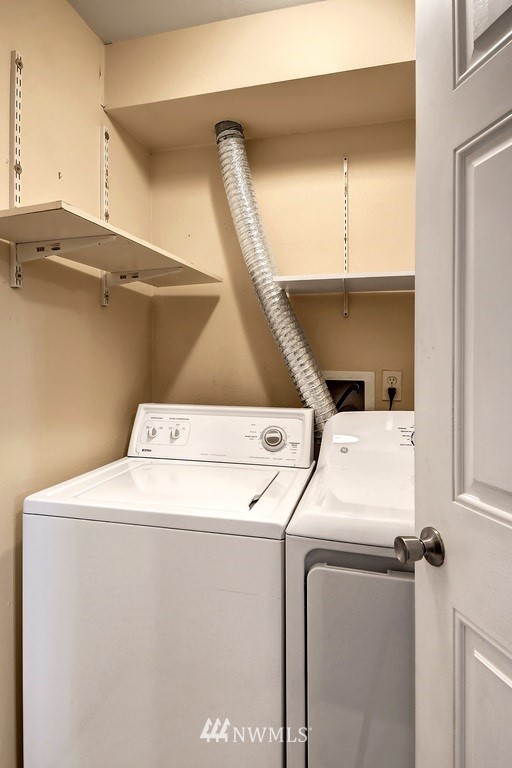 3224 21st Avenue West, Unit B Seattle, WA 98199 - Photo 15 of 17 a utility room with dryer and washer