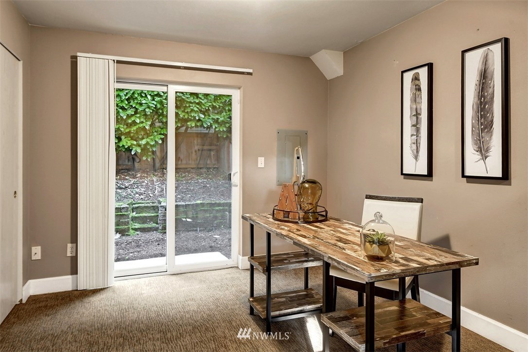 3224 21st Avenue West, Unit B Seattle, WA 98199 - Photo 8 of 17 a workspace with furniture and a window