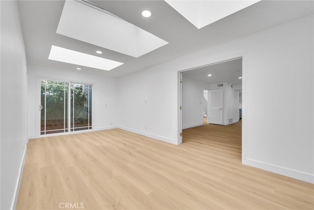 18 Meadowsweet Way Irvine, CA 92612 - Photo 16 of 66 wooden floor in an empty room with a window