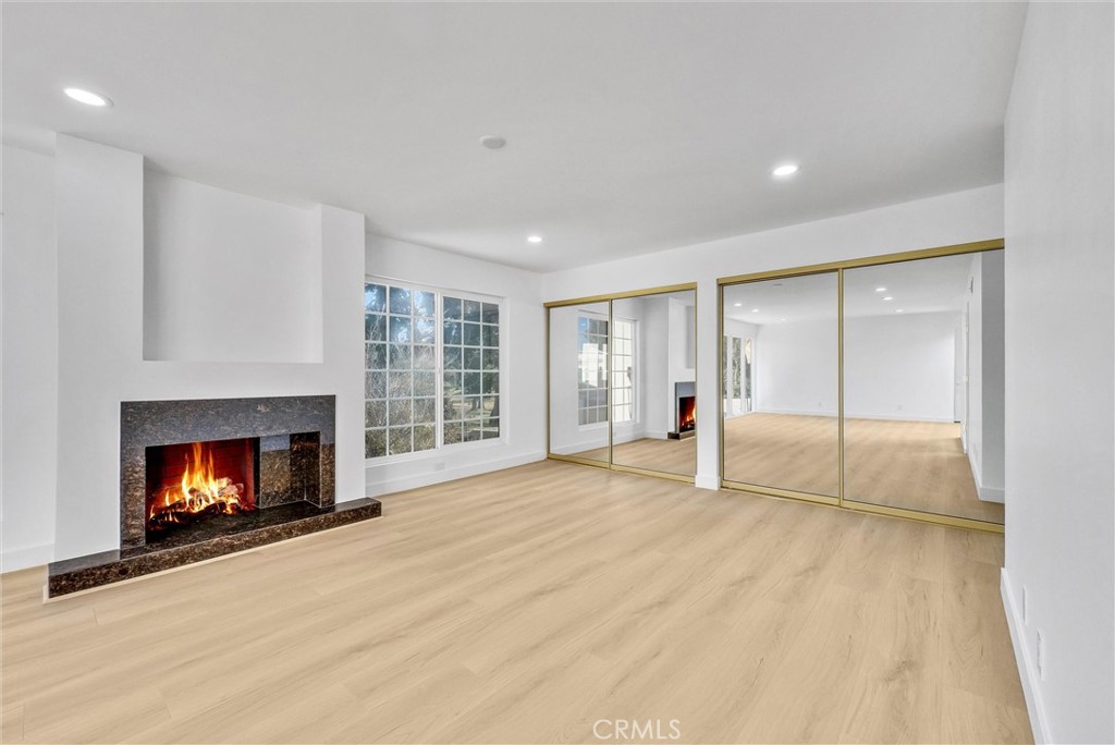 18 Meadowsweet Way Irvine, CA 92612 - Photo 28 of 66 a view of an empty room with a fireplace and a window