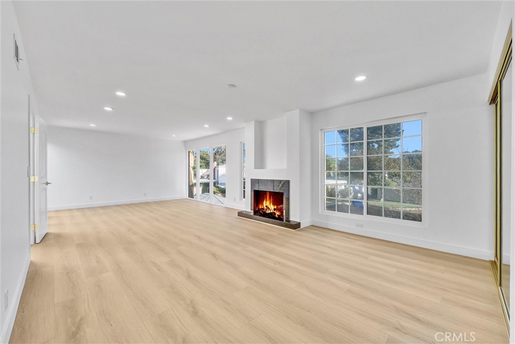 18 Meadowsweet Way Irvine, CA 92612 - Photo 29 of 66 a view of an empty room with a window and fireplace