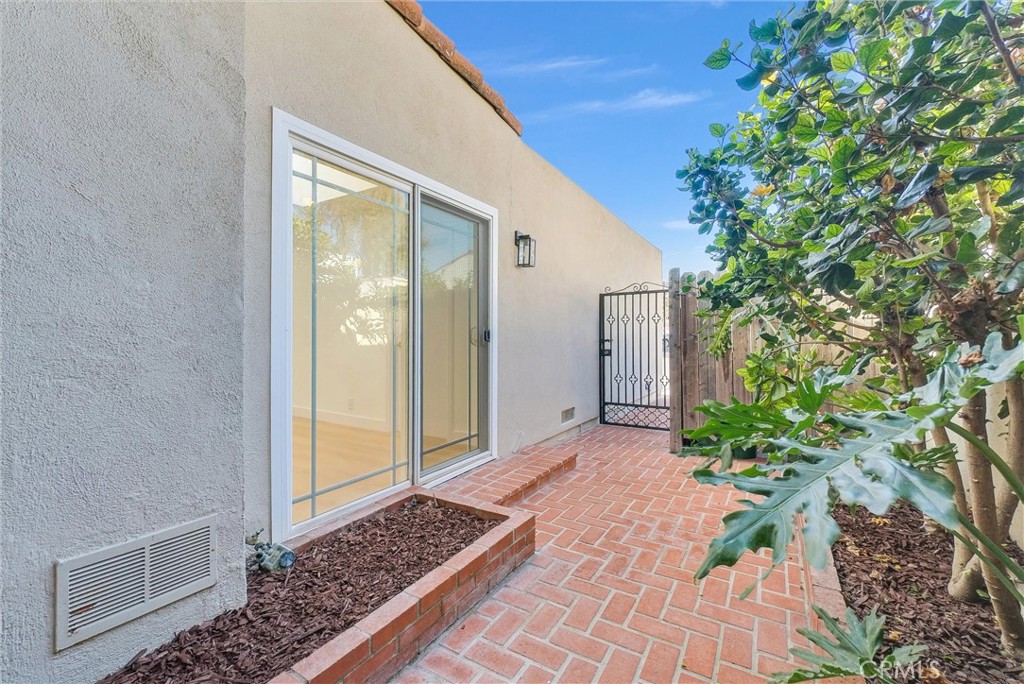 18 Meadowsweet Way Irvine, CA 92612 - Photo 45 of 66 a view of backyard with potted plants