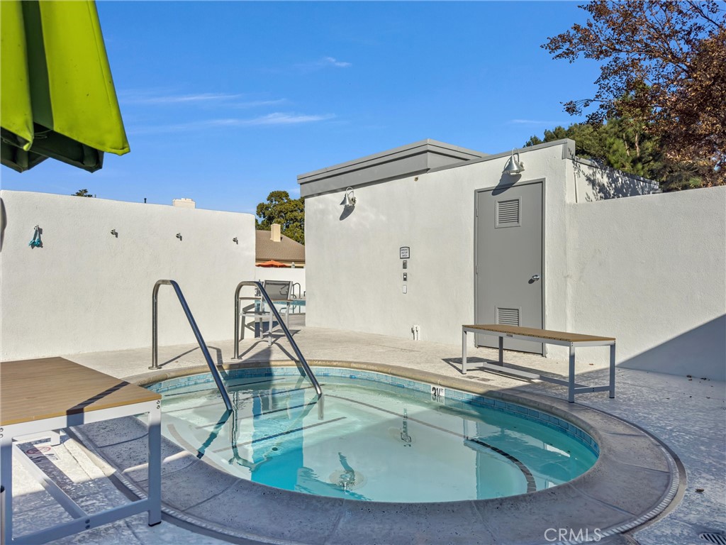18 Meadowsweet Way Irvine, CA 92612 - Photo 62 of 66 a view of a swimming pool with a lounge chair