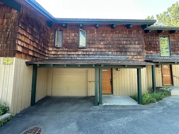 a house view with a outdoor space