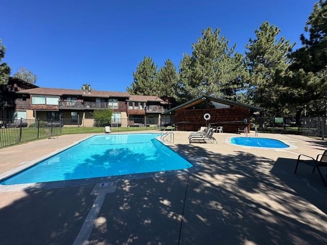 3199 Chateau Road, Unit 17 Mammoth Lakes, CA 93546 - Photo 16 of 23 a swimming pool view with a seating space