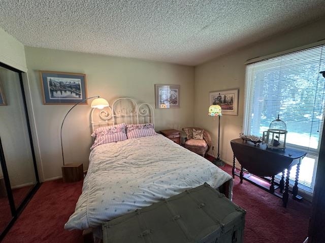 3199 Chateau Road, Unit 17 Mammoth Lakes, CA 93546 - Photo 8 of 23 a bedroom with a bed and wooden floor