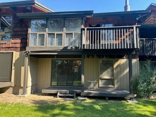 a view of a two chair in the patio