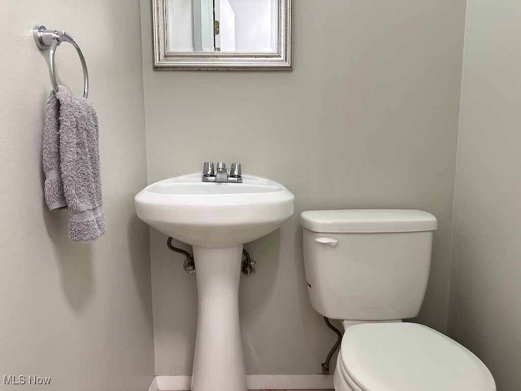 6482 State Road, Unit E1 Parma, OH 44134 - Photo 19 of 48 1/2 Bathroom on the first floor