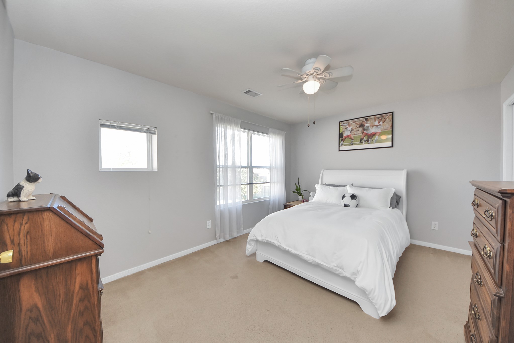 16820 Infield Court Conroe, TX 77385 - Photo 36 of 44 1st of 3 secondary generous size bedrooms on 2nd floor.