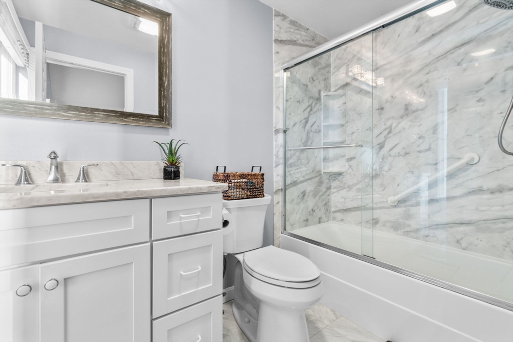 83 Dolar Davis Road Barnstable, MA 02632 - Photo 11 of 36 a bathroom with a sink a toilet and shower