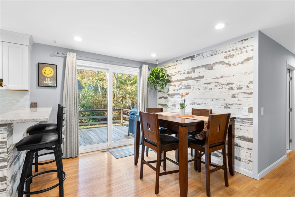 83 Dolar Davis Road Barnstable, MA 02632 - Photo 2 of 36 a view of a dining room with furniture and wooden floor