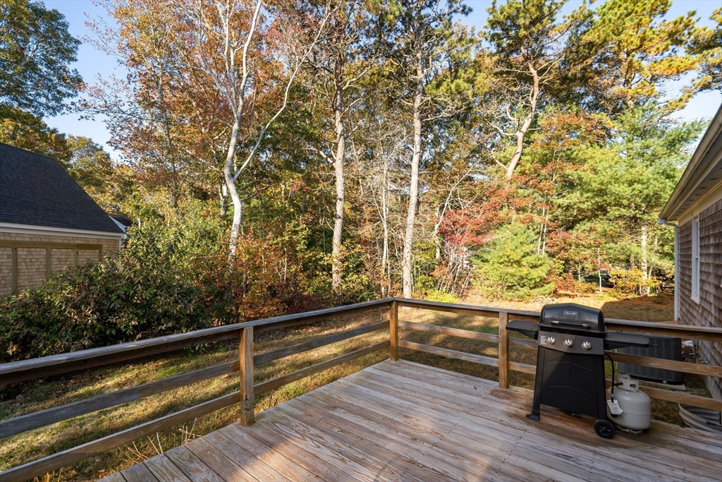 83 Dolar Davis Road Barnstable, MA 02632 - Photo 22 of 36 a view of balcony with wooden floor and seating space