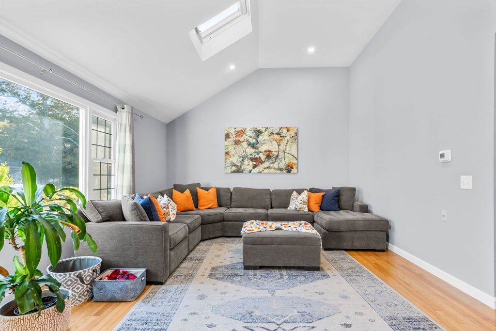 83 Dolar Davis Road Barnstable, MA 02632 - Photo 8 of 36 a living room with furniture and a large window