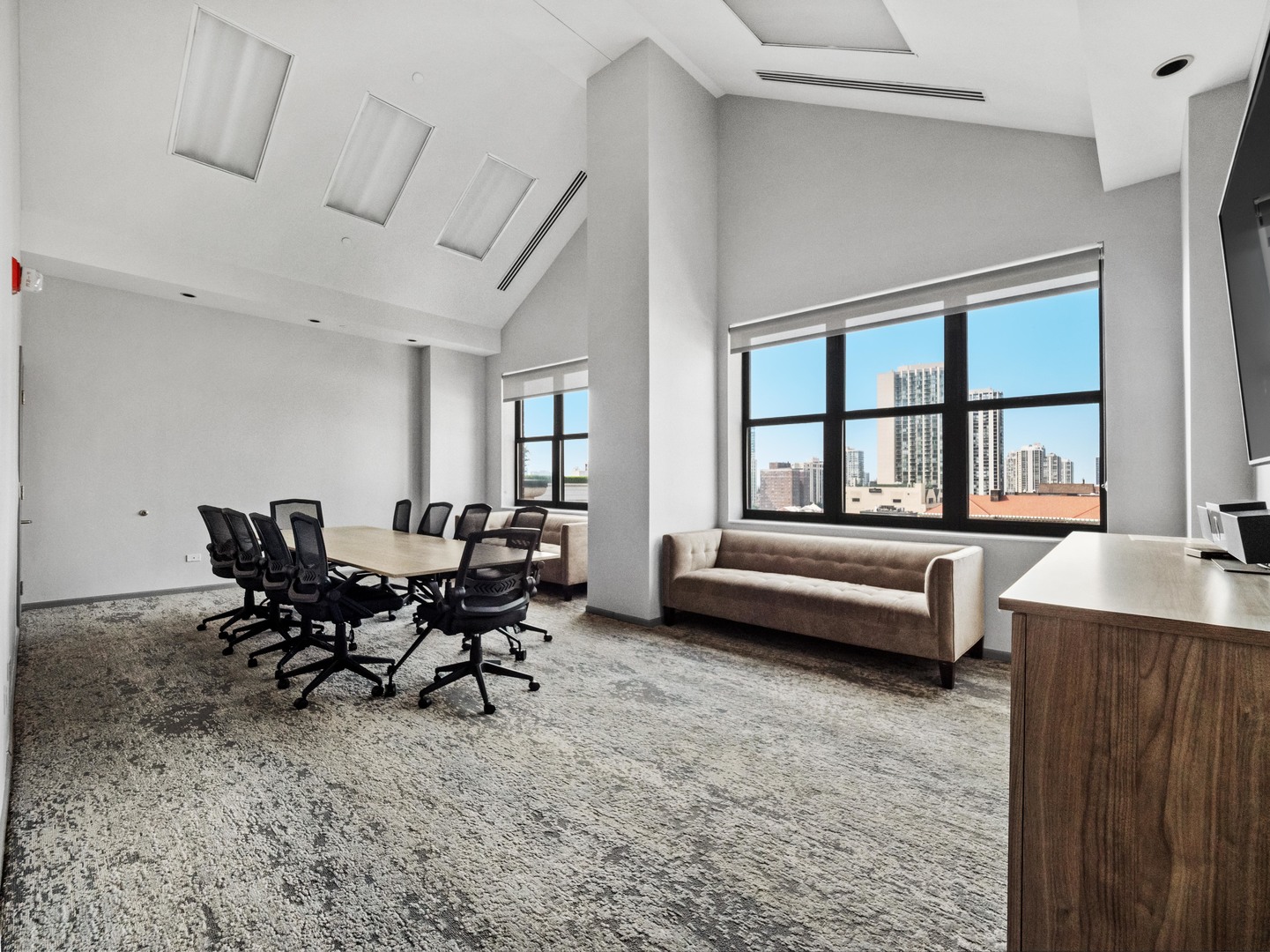 55 West Delaware Place, Unit 921 Chicago, IL 60610 - Photo 23 of 33 a living room with furniture and a window
