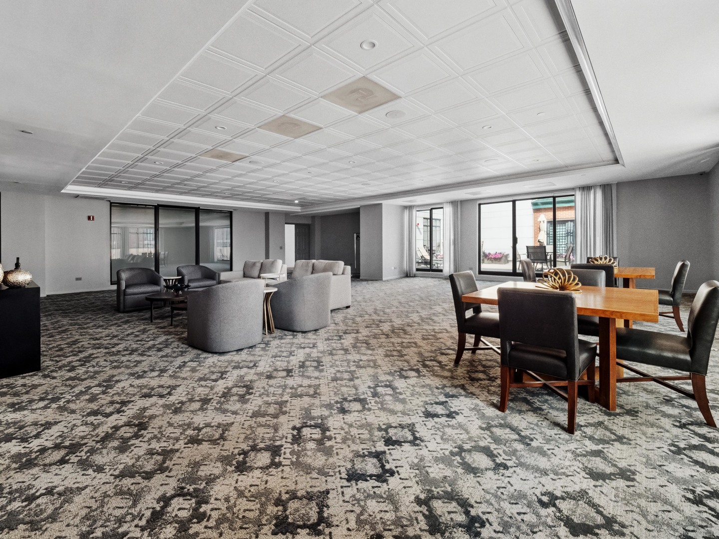 55 West Delaware Place, Unit 921 Chicago, IL 60610 - Photo 25 of 33 a view of a dining room with furniture