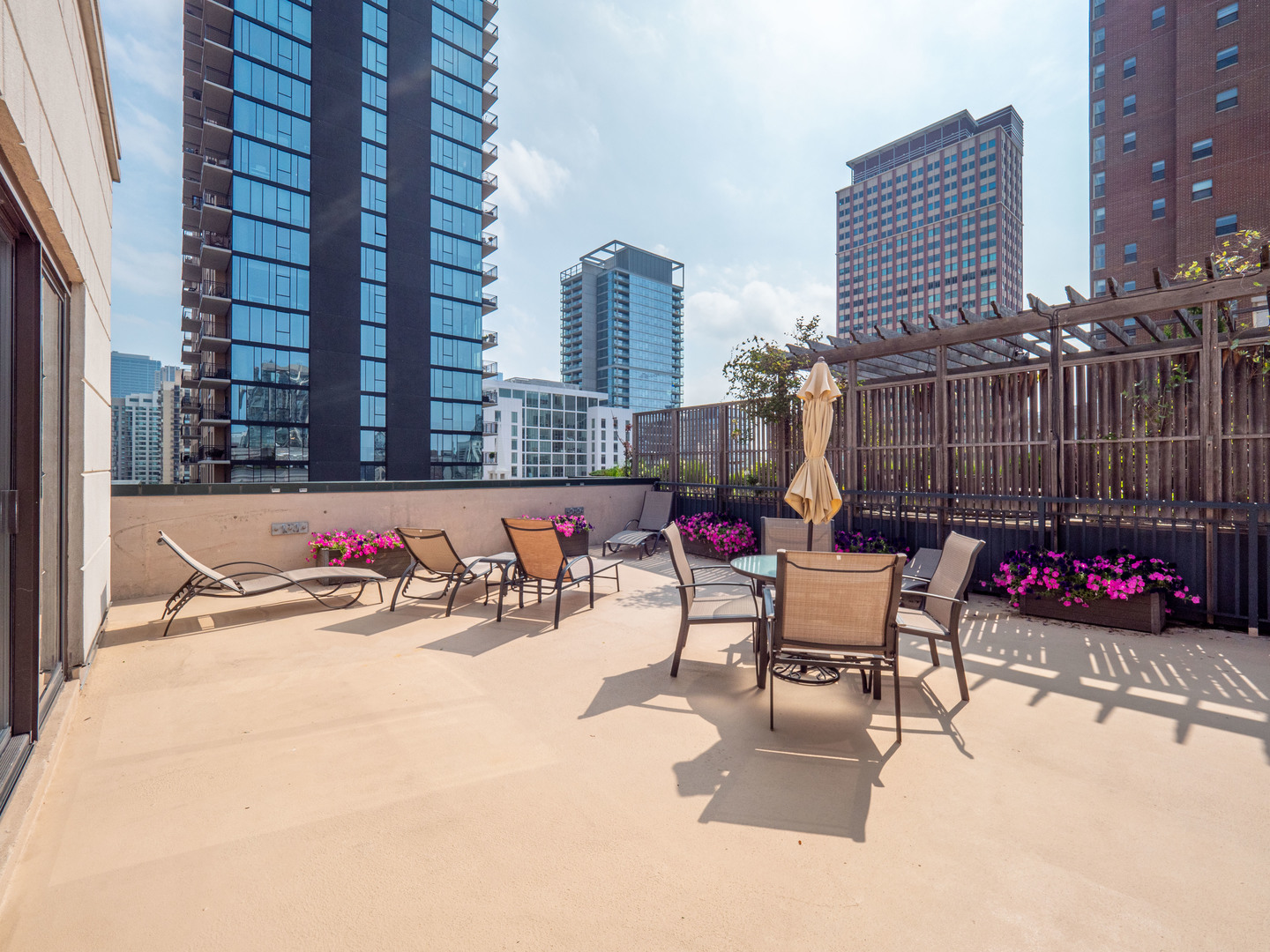 55 West Delaware Place, Unit 921 Chicago, IL 60610 - Photo 27 of 33 a view of a terrace with sitting area