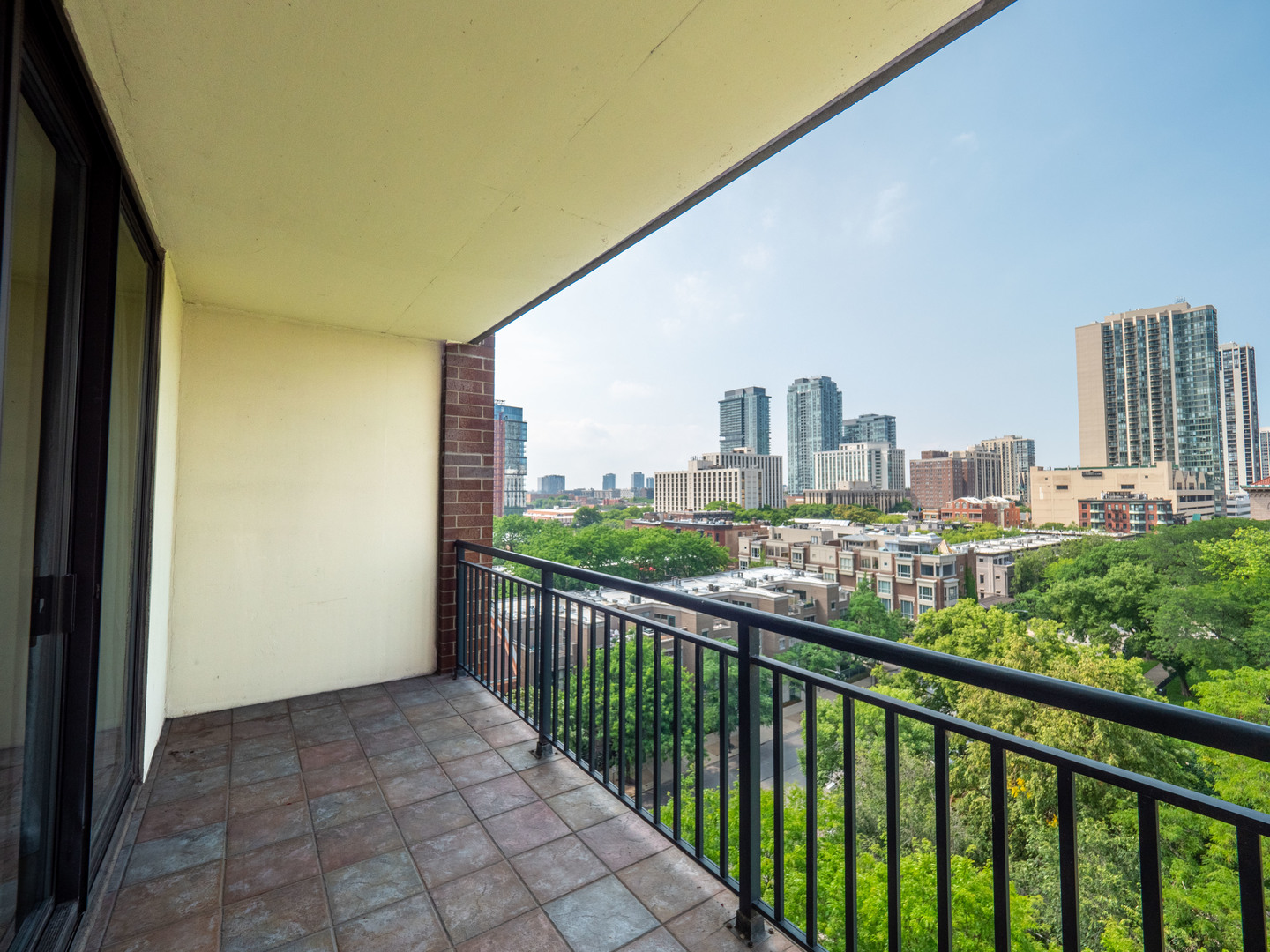 55 West Delaware Place, Unit 921 Chicago, IL 60610 - Photo 4 of 33 a view of city from a balcony