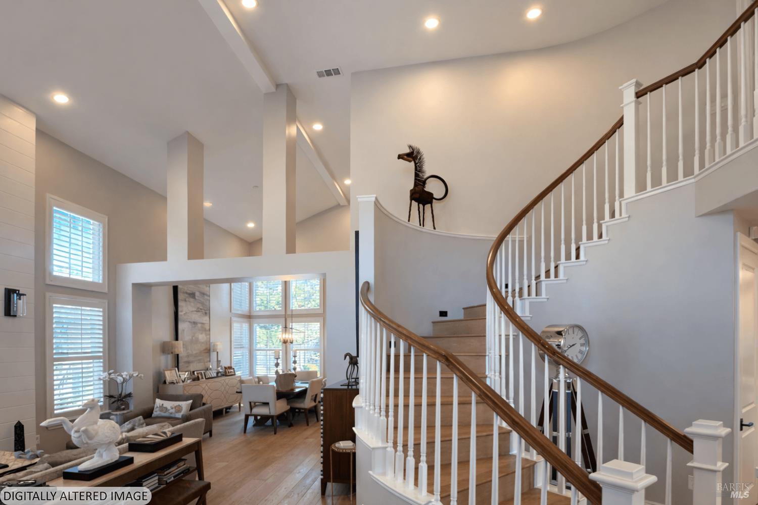 3726 Cannes Place Santa Rosa, CA 95403 - Photo 9 of 69 Look at this gorgeous staircase and high ceilings as we enter this 2020 built home. The home offers vaulted ceilings and a great room feel, while also offering a formal dining room and a separate family room on the other side of the home.