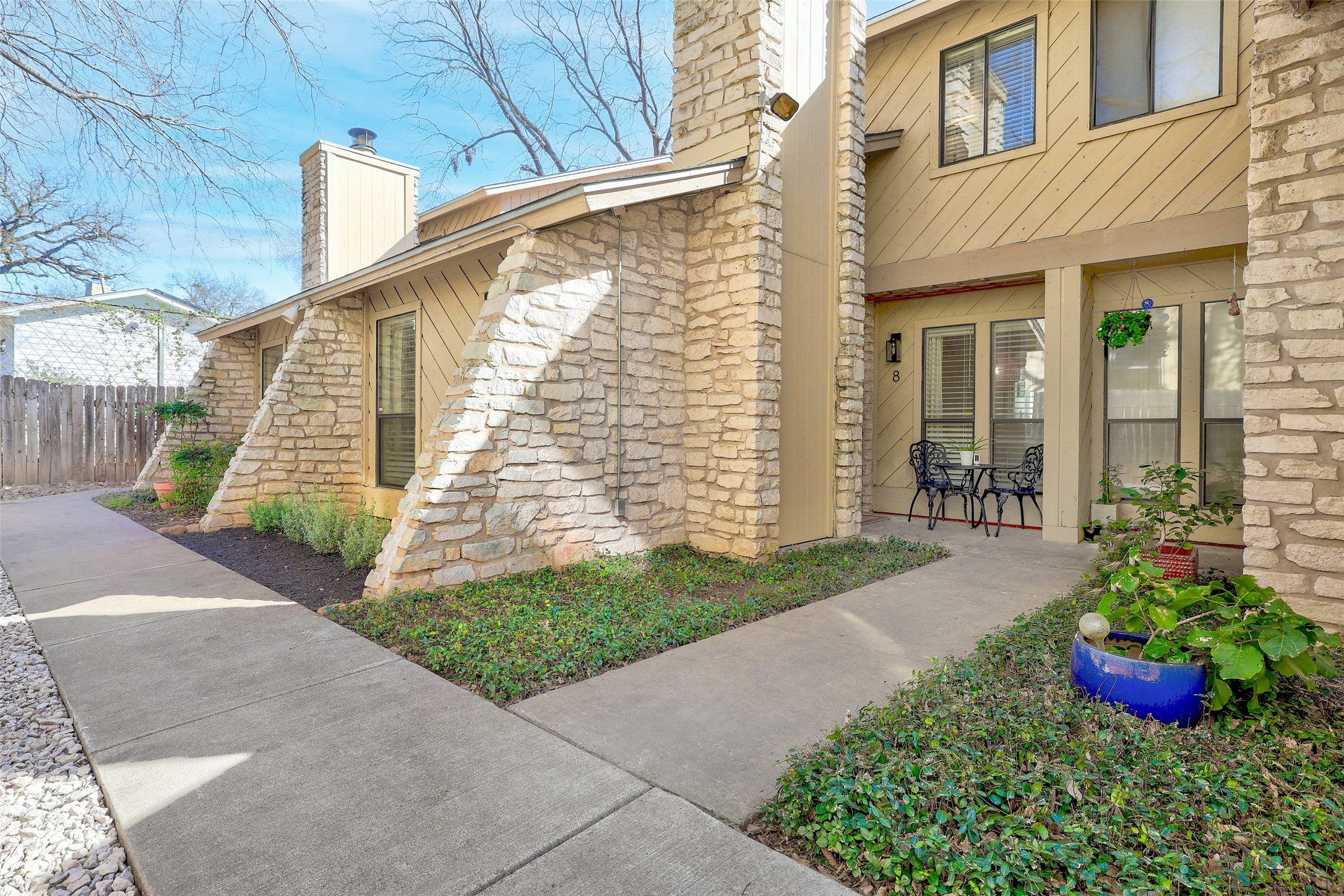 2500 Enfield Road, Unit 8 Austin, TX 78703 - Photo 1 of 1 a view of a house with potted plants