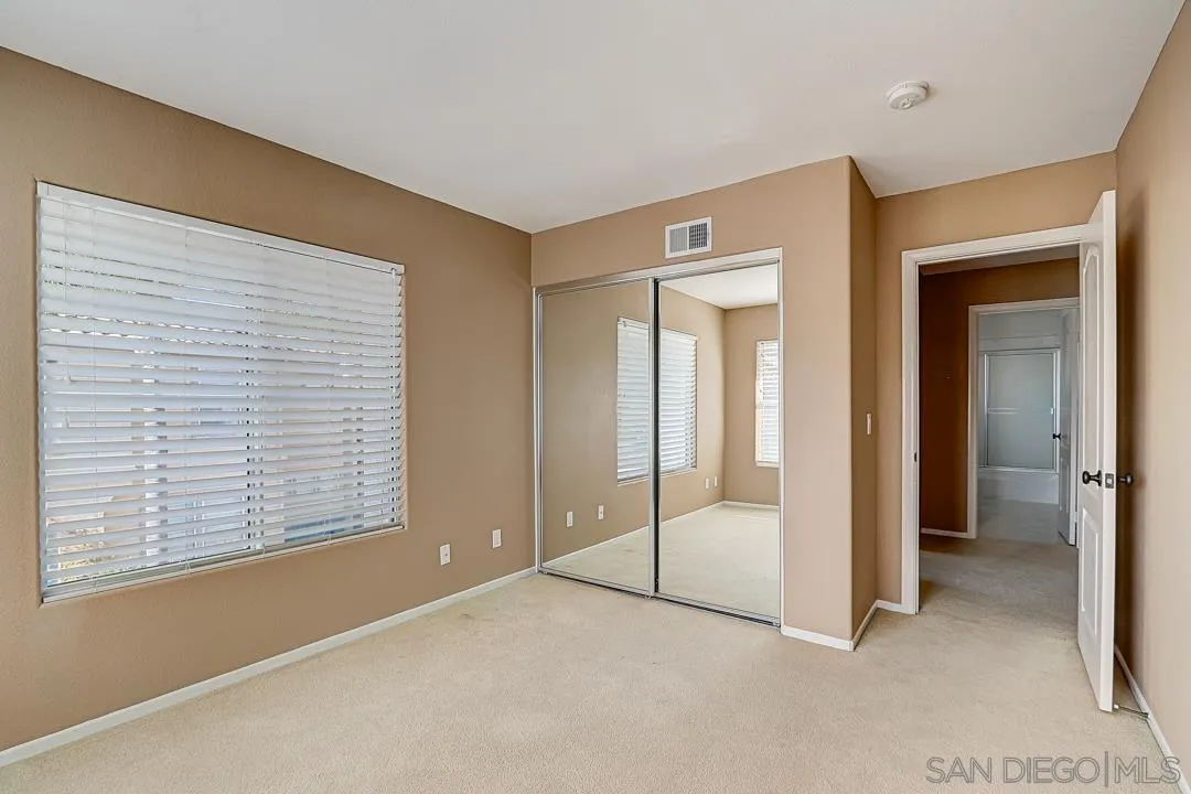 7134 Pintail Drive Carlsbad, CA 92011 - Photo 11 of 30 a view of an empty room and window