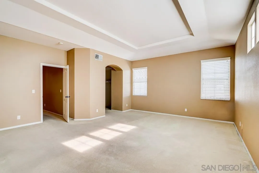 7134 Pintail Drive Carlsbad, CA 92011 - Photo 17 of 30 a view of an empty room with a window