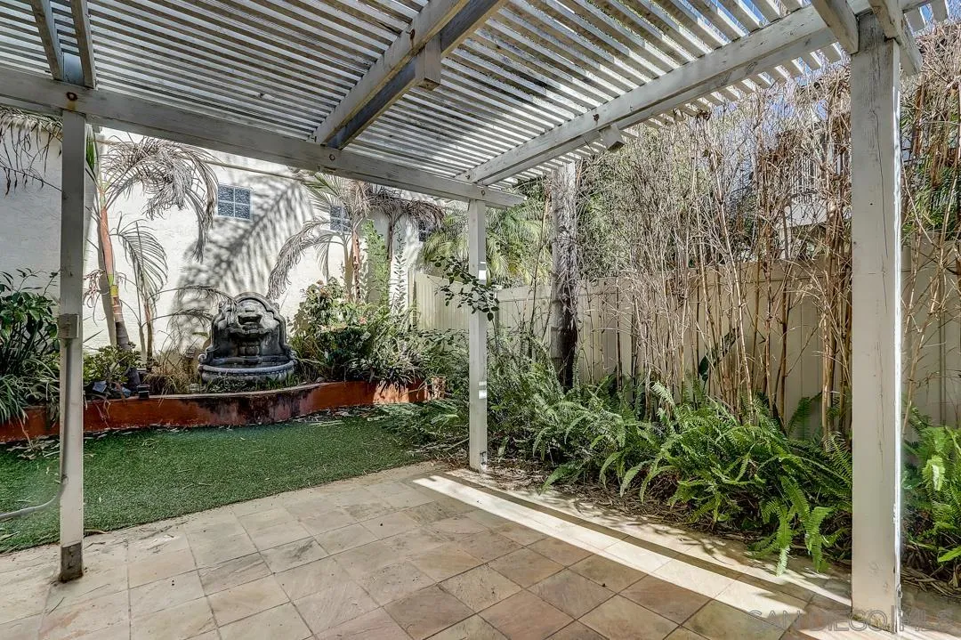 7134 Pintail Drive Carlsbad, CA 92011 - Photo 30 of 30 a view of a porch with plants and trees