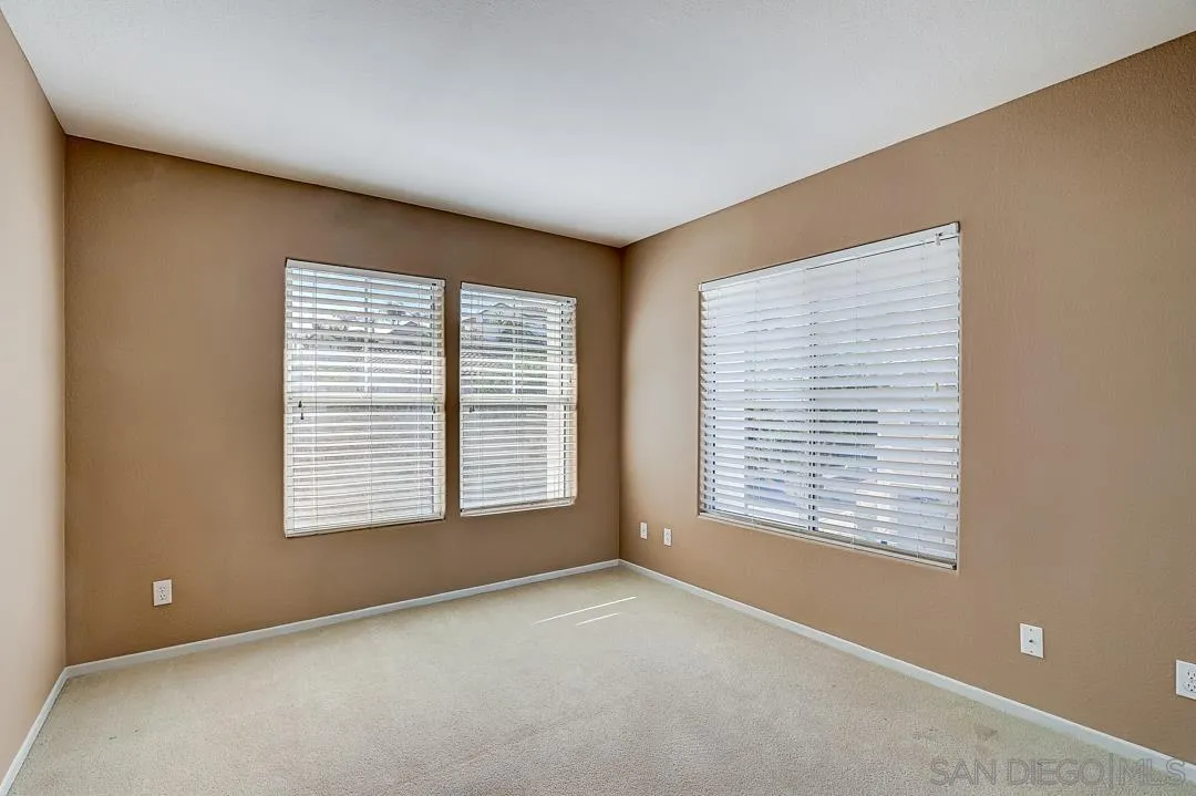 7134 Pintail Drive Carlsbad, CA 92011 - Photo 10 of 30 a view of an empty room with a window