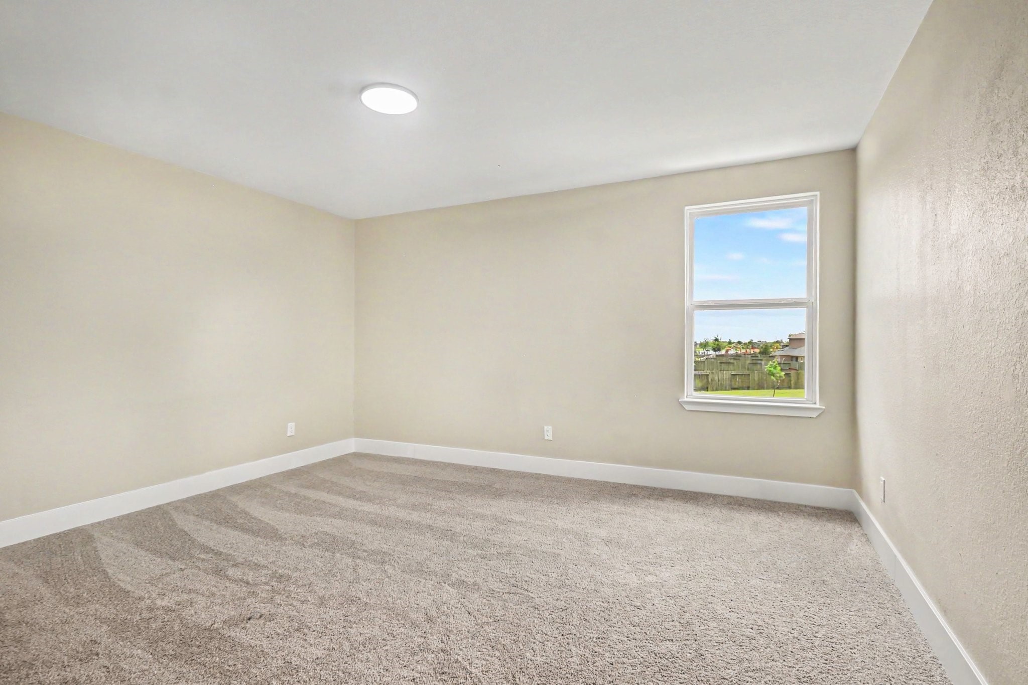 1322 Diamond Drape Drive Rosharon, TX 77583 - Photo 29 of 45 an empty room with windows