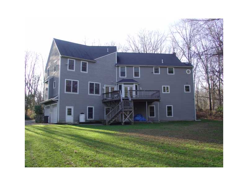 411 West Wrentham Road Cumberland, RI 02864 - Photo 2 of 14 Exterior Back.
