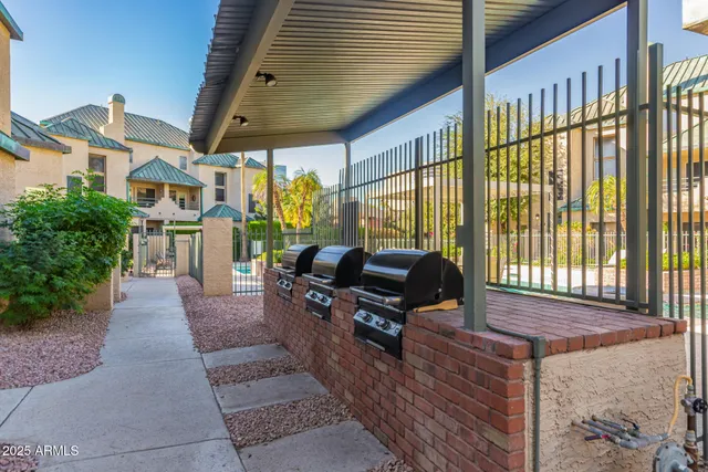 a building outdoor space with patio furniture