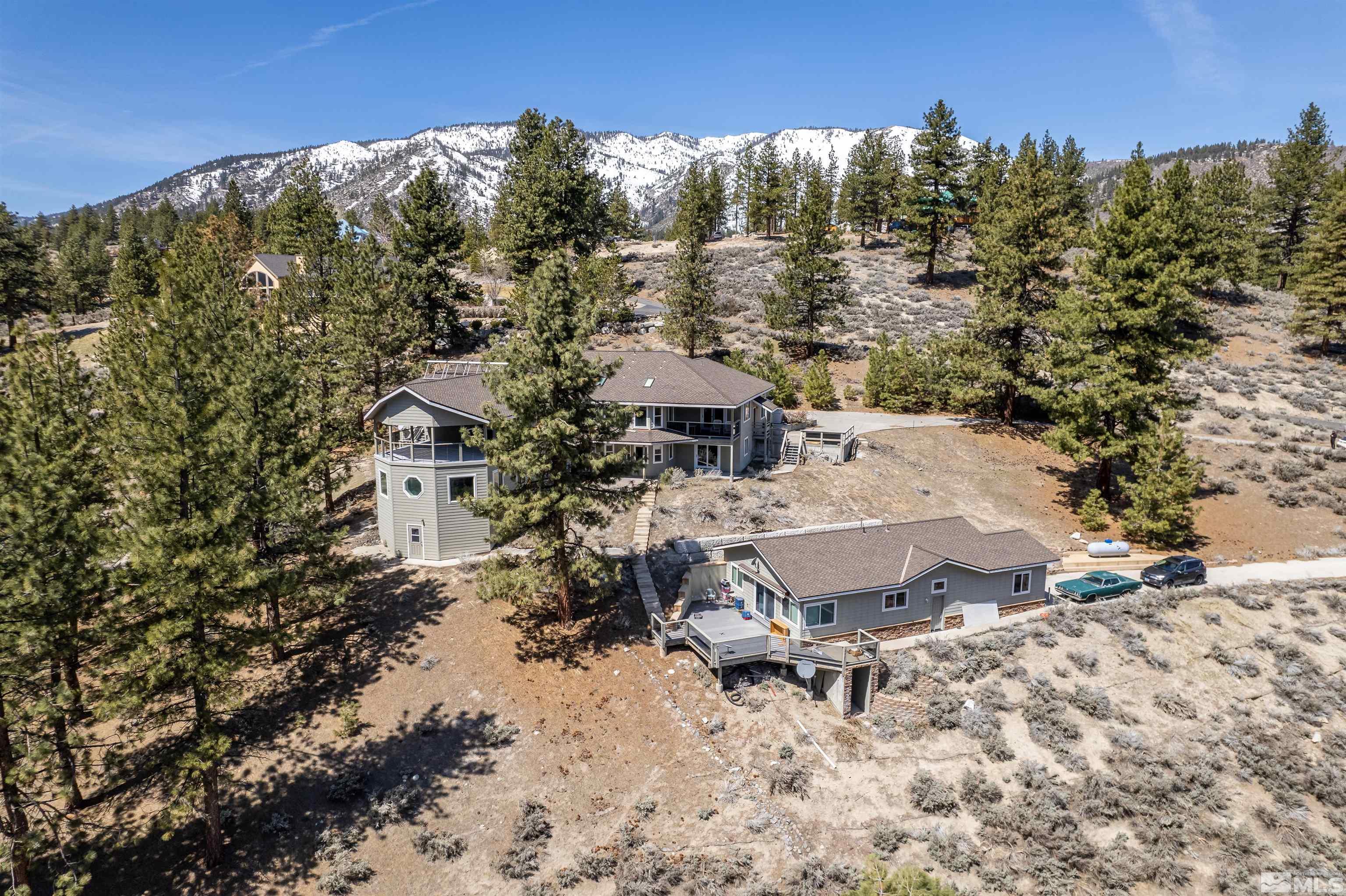 4670 Old Clear Creek Road Carson City, NV 89705 - Photo 3 of 8 a view of a house with a yard and sitting area